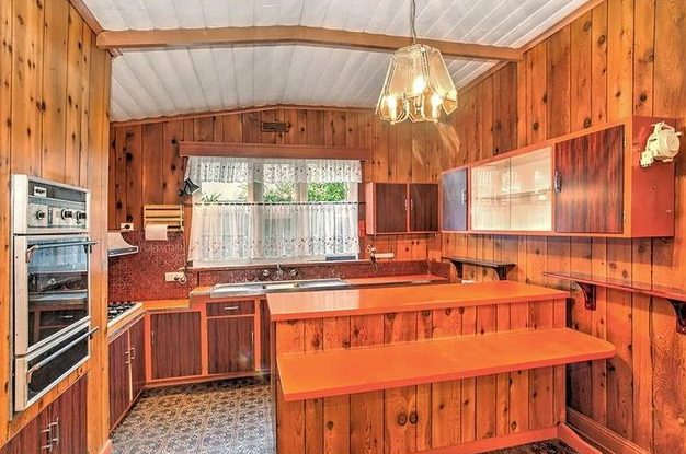 Original timber kitchen before renovation at Stevedore Street